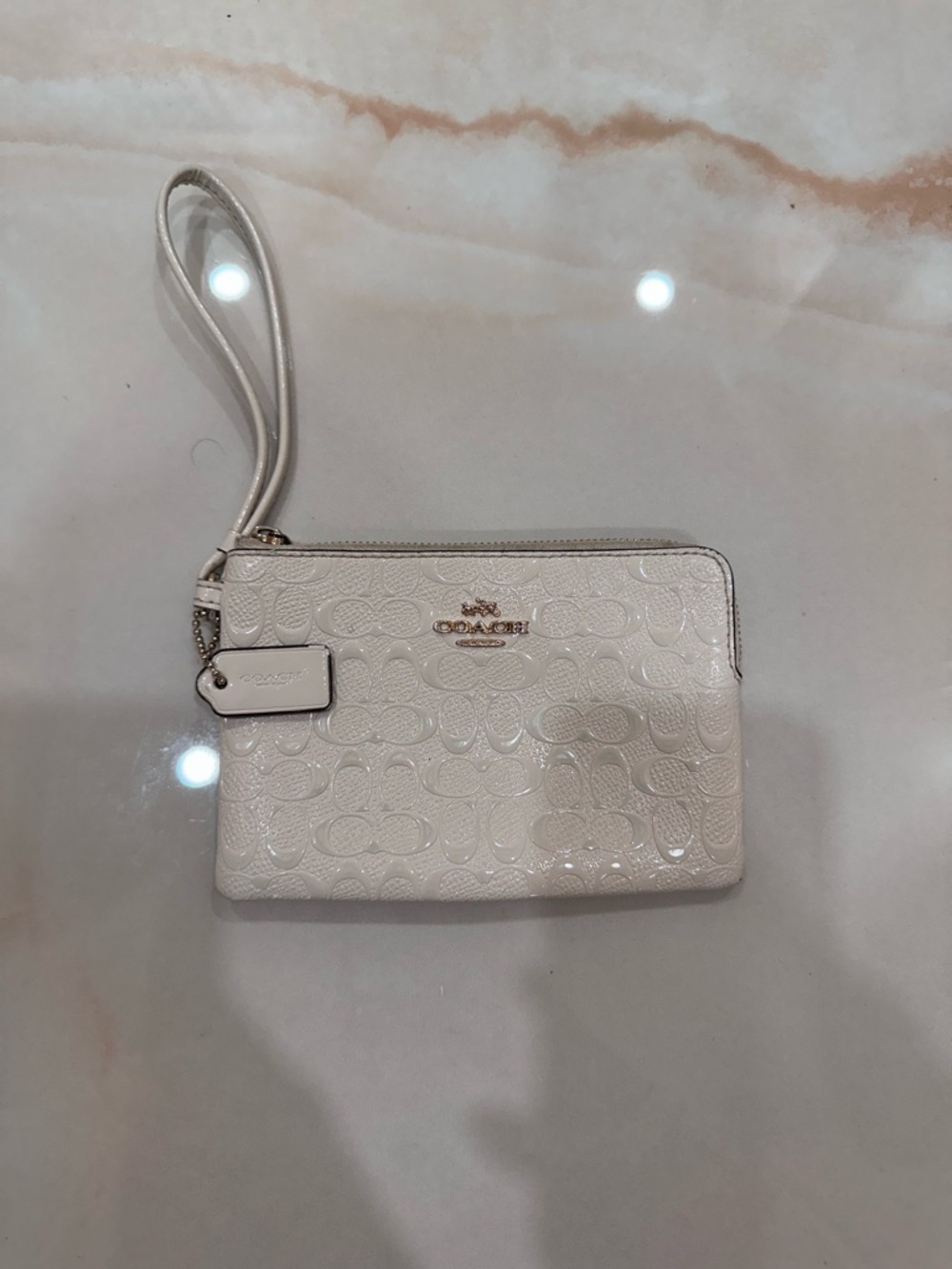 COACH White Embossed Signature Wristlet